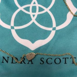 Kendra Scott gold pendant in iridescent drusy